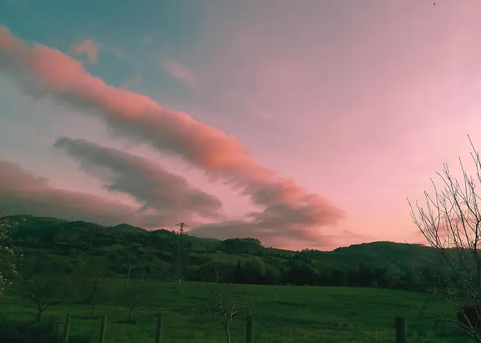 Con Jardin A 5 Minutos De La Playa 펜션 코룬가